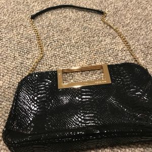 Clutch with shoulder strap